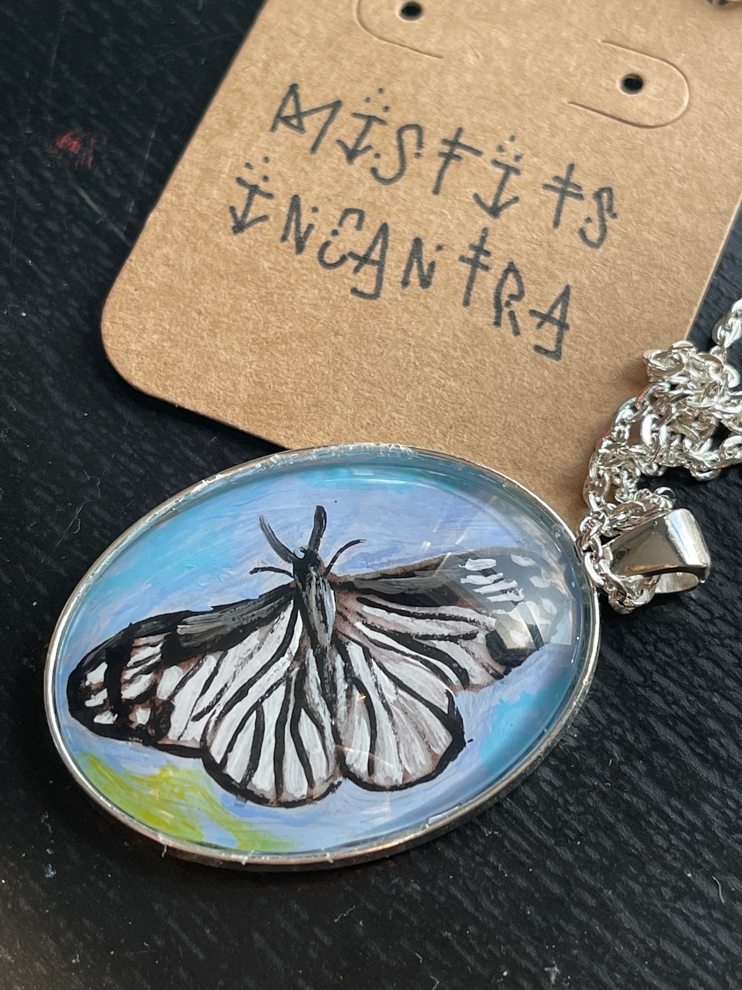 Pine White ~ hand painted butterfly oval pendant