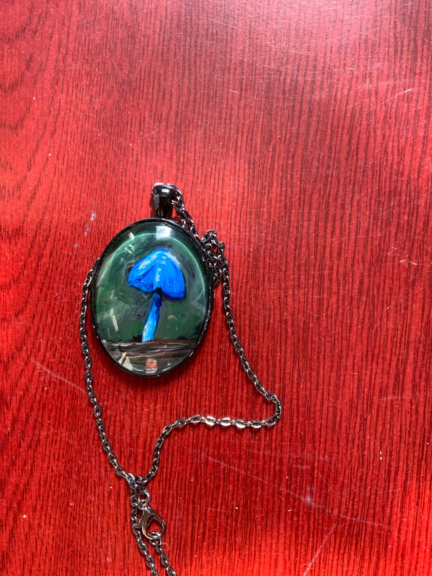 Blue pinkgill mushroom pendant