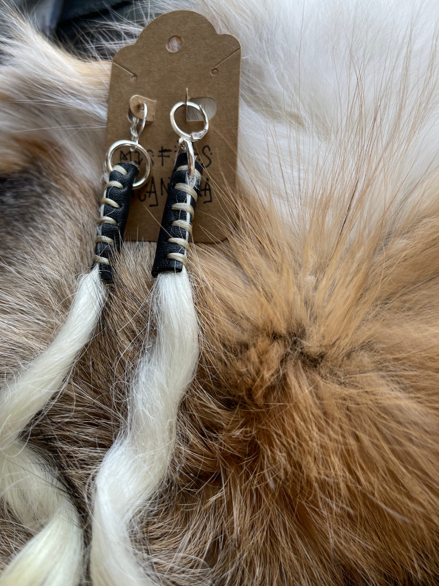 Mâyatik earrings in au natural in black leather