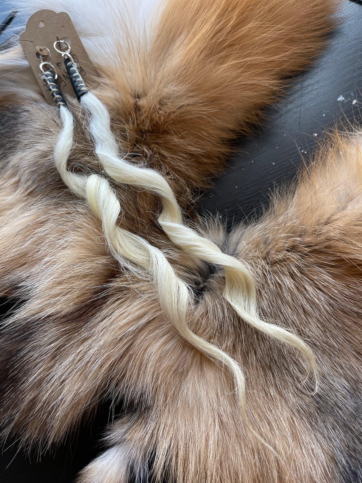 Mâyatik earrings in au natural in black leather